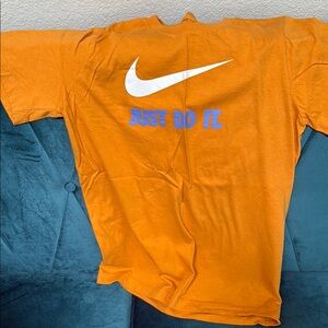 Nike Orange Tee with White Swoosh and Blue Text